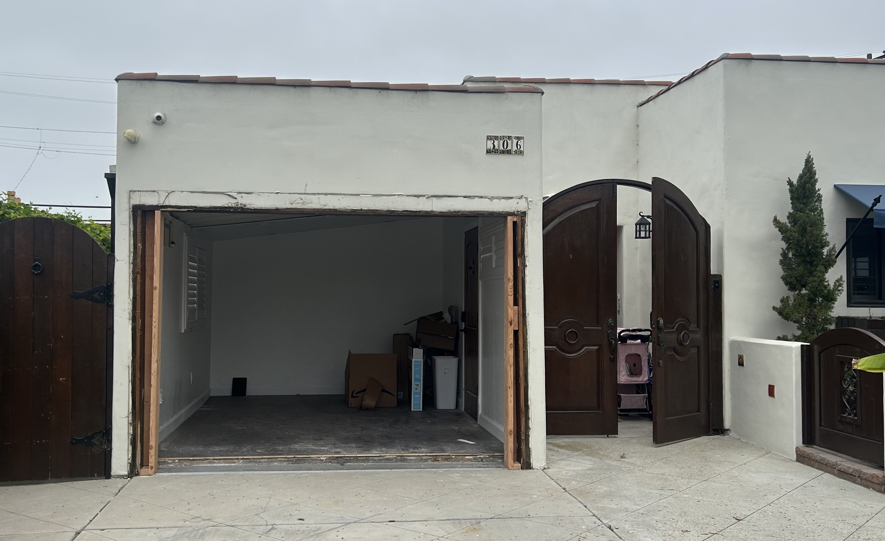 san clemente empty garage without garage door waiting for installation