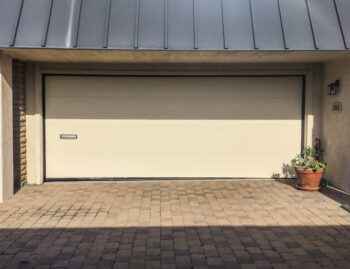 modern almond flush garage door upgrade in dana point