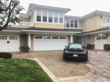brand new wood overlay garage door in dana point