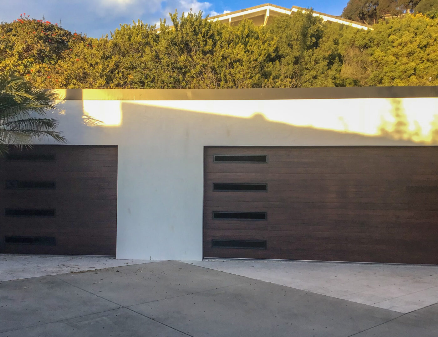 steel faux wood mahogany color garage door installed in dana point ca
